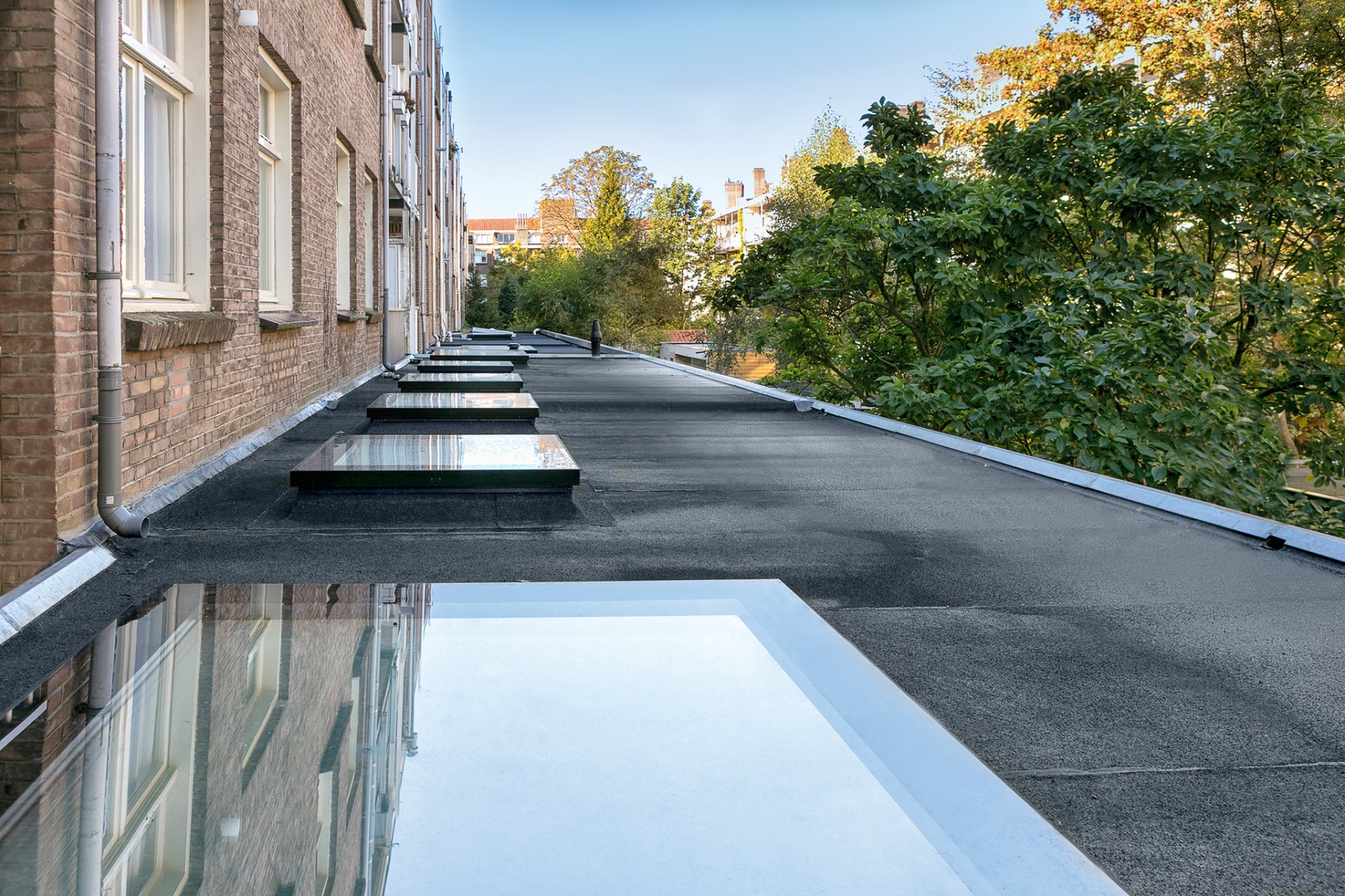 Flat Roof Deck Mounted Skylights FAKRO USA